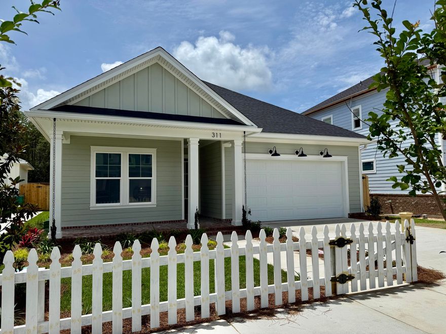 A stunning 1 story plan, the DOGWOOD, in Deer Moss Creek's newest phase, Brookfield. Est completion JUNE '26. 3-4 bedrooms (or 3 w office/bonus rm) and 2 full baths. Seller to pay 1% towards total closing costs plus $10,000 rate buy down or closing costs assistance (with another $2000 if using the preferred lender). Open floor plan on 1 floor, w/ LVP flooring in main living & tile in wet areas. Michaelangelo, white quartz counters and white shaker, wood soft close cabinetry. White custom melanine pantry shelves & custom master closet. Apron front sink in kitchen as well as a gas range, and SS appliances. Forward facing garage gorgeous curb appeal!