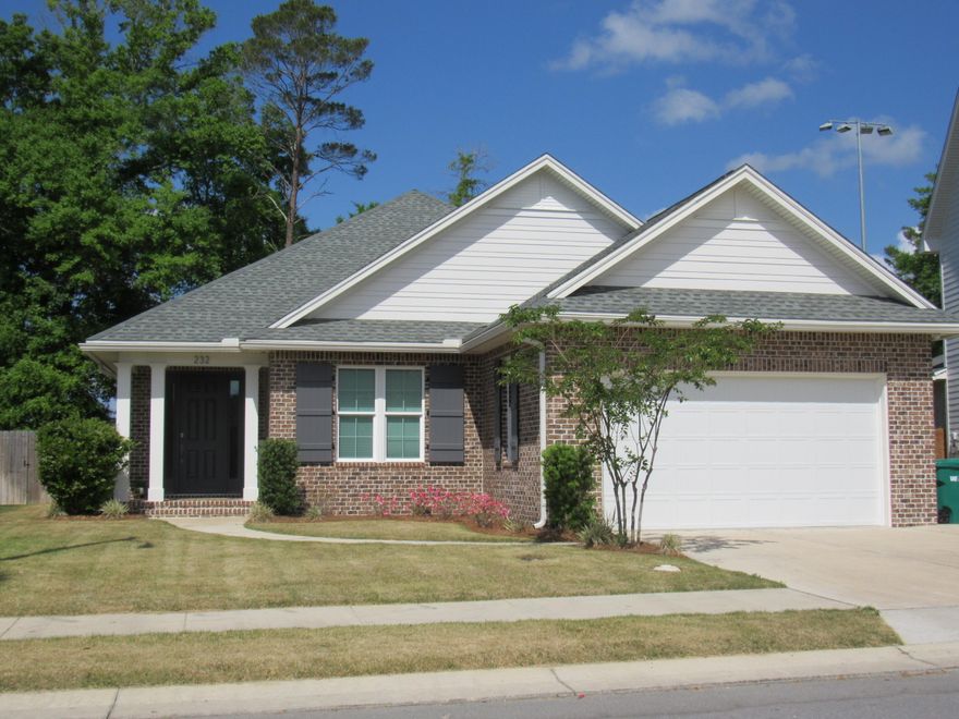 EAGLES LANDING like new home built by premier builder!   This home features 4 beds-3 full baths, split bedrooms, gorgeous interior to include: 8' doors, LVP & tile flooring, quartz countertops, soft close cabinetry & drawers, Bosch stainless steel appliances (frig, microwave, dual fuel convection range & dishwasher), tankless gas hot water heater, tiled showers, impact windows & doors, smart panel for technology, finished garage, screened porch, patio & much more! Full landscaping & irrigation. Buyer to verify all deemed important info.  Pictures are of similar completed home.