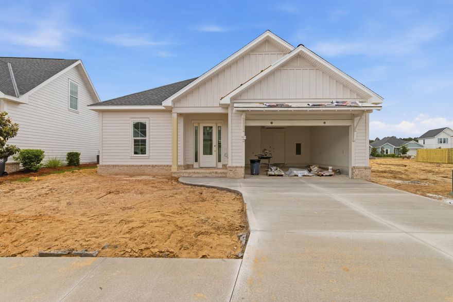 Welcome to the Alana II by Huff Homes, a 1,690 square foot single-level residence located in the Longleaf Park neighborhood of Watersound Origins, offering 2 bedrooms, 2 bathrooms, a dedicated study, and a 2-car garage.

Entering through the front porch, the foyer opens to a central living space with clear sightlines through the home. The living room connects directly to the dining area and kitchen, creating a continuous layout that extends to the screened rear porch. The kitchen includes a large island, quartz countertops, wood cabinetry with soft-close features, upgraded Bosch appliance package in stainless steel, vent hood, and a tiled backsplash.

The study is located just off the main living area toward the rear of the home, providing a defined workspace or flex room. The screened rear porch extends the living space outdoors and overlooks the backyard.

The primary suite is privately positioned at the rear left side of the home and includes a walk-in closet and a bathroom with a tiled shower, quartz dual vanity, and porcelain tile flooring. A secondary bedroom and full bathroom are located near the front of the home, offering separation for guests.

Additional interior features include 10-foot ceilings, 8-foot solid core interior doors, luxury vinyl plank flooring throughout the main living areas, recessed lighting, crown molding in the foyer, living, dining, and kitchen, and ceiling fans in all bedrooms and living spaces. The home also includes a dedicated laundry room, energy-efficient systems, and is pre-wired for home automation and security.

Exterior features include cement fiber siding, heirloom brick detailing at the front and rear porches, a screened rear porch, and professional landscaping package with irrigation.

Located within Watersound Origins, Longleaf Park provides access to community amenities including the Origins Golf Course, Village Commons pool and fitness center, and miles of walking and biking trails.