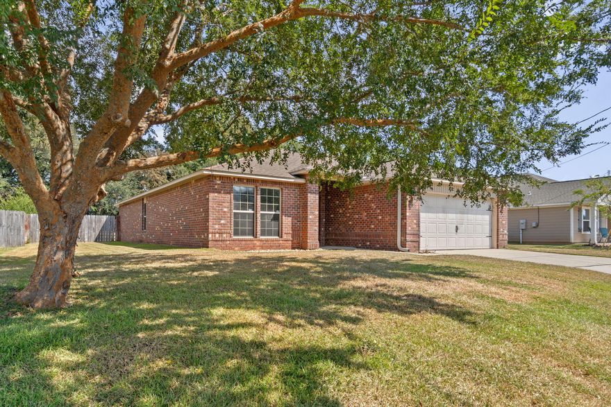 Price Improvement -- now positioned to compete! All-brick 3BR/2BA home on a .36-acre fenced lot in Baker, FL with NO HOA. If you've been watching this home, now is the time to take a second look. Offering 1,922 square feet and a two-car garage, this move-in-ready home delivers features you won't always find in nearby new construction -- including an established neighborhood, larger lot, and fully fenced yard.Inside, enjoy an open floor plan with luxury vinyl flooring in the main living areas. The kitchen features granite countertops, stainless steel appliances, a wrap-around breakfast bar, walk-in pantry, and separate laundry room. The private primary suite includes double doors, a large walk-in closet, dual-sink vanity, soaking tub, and separate shower.  Two additional bedrooms and a full bath provide flexible space for family or guests. Step outside to a covered back porch and spacious backyard -- ideal for pets, play, or relaxing evenings. Conveniently located near Baker School with easy access to military bases, shopping, and main commute routes. Schedule your showing today -- this new price creates a strong opportunity in today's market.