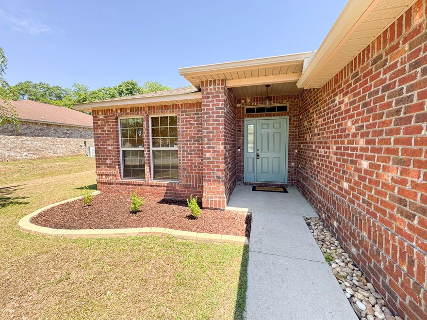 Price Improvement -- now positioned to compete! All-brick 3BR/2BA home on a .36-acre fenced lot in Baker, FL with NO HOA. If you've been watching this home, now is the time to take a second look. Offering 1,922 square feet and a two-car garage, this move-in-ready home delivers features you won't always find in nearby new construction -- including an established neighborhood, larger lot, and fully fenced yard.Inside, enjoy an open floor plan with luxury vinyl flooring in the main living areas. The kitchen features granite countertops, stainless steel appliances, a wrap-around breakfast bar, walk-in pantry, and separate laundry room. The private primary suite includes double doors, a large walk-in closet, dual-sink vanity, soaking tub, and separate shower.  Two additional bedrooms and a full bath provide flexible space for family or guests. Step outside to a covered back porch and spacious backyard -- ideal for pets, play, or relaxing evenings. Conveniently located near Baker School with easy access to military bases, shopping, and main commute routes. Schedule your showing today -- this new price creates a strong opportunity in today's market.