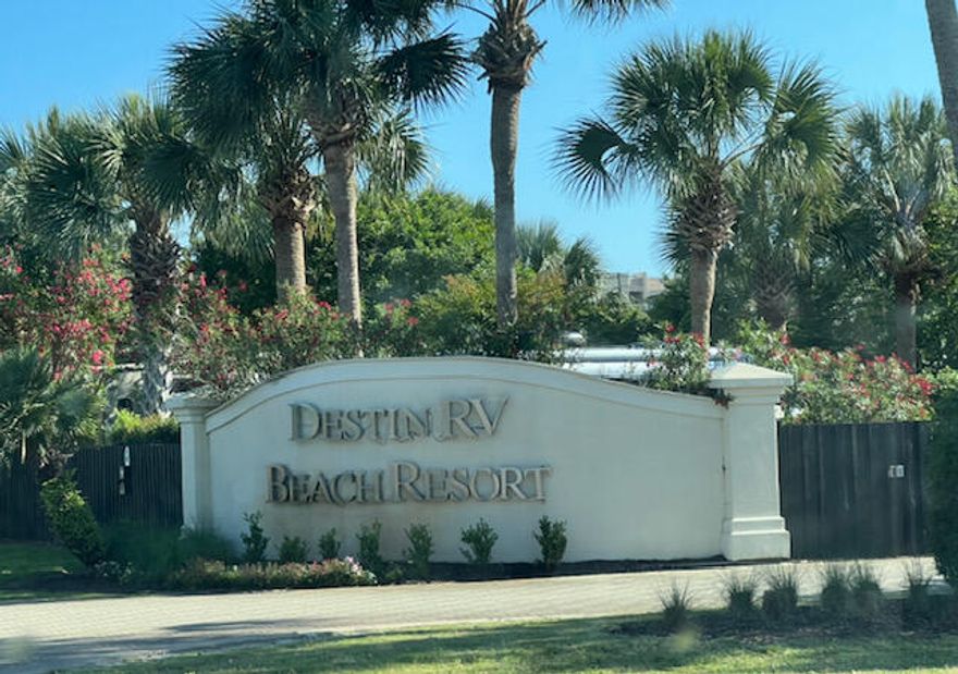 This is a rare opportunity to OWN A LOT at DESTIN BEACH RV RESORT. Spaces rarely come up for sale at this luxury 36 space RV Resort directly across the street from one of the most beautiful sugar white sand beaches in the entire world. AMENTIES OF THE PARK INCLUDE private beach access, heated pool, designer paver streets, lush tropical landscaping and landscape lighting, gated entry, owners room, heated and cooled bath house and laundry facility, on site guest condo rentals. This RV Resort allows you to rent your lot within the rental management program that the HOA has established and this lot has an EXCELLENT RENTAL HISTORY which is estimated to gross approximately $30,000 this year so as an investor at the $298,500 price you would be looking at a return of likely around 5% after expenses plus the appreciation of the property and being able to use it. This is a good option for 1031 exchange buyers as well looking to park funds in an appreciating and cash flowing asset. 

HOA dues of $403/month include water, Wi-Fi and garbage services and all of the other amenities listed above. Enjoy the best of both worlds as an investment property that pays for itself while using it for family getaway vacations to one of the most beautiful beaches in the world.

This RV Park not only has walk over or golf cart ride over to the beach access but it is conveniently walking distance to many fun local restaurants like Surf Hut and Whales tail as well as the Embassy Suites hotel that is adjacent to the RV park. This RV park accepts RV's over 25ft including Class A, B, C motorhomes and travel trailers as well as 5th wheels. There are not many condo RV parks that allow rentals which cover expenses and there are also not many RV parks that you can own a space that are this close to the beach.  MAKE LOT #22 YOURS TODAY!