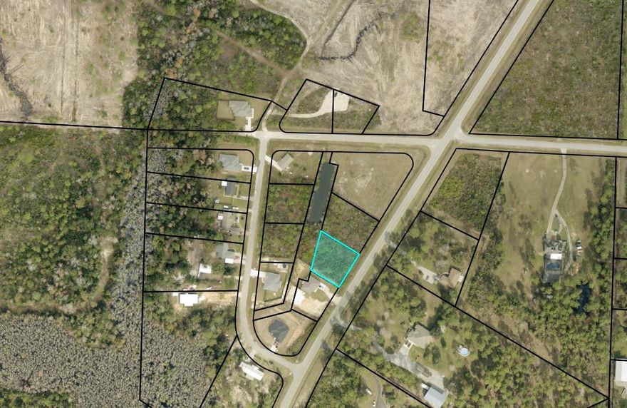 Discover the perfect opportunity to build your dream home on this beautiful, buildable lot in the desirable Garcon Point area. Ideally situated just a short drive from the white-sand beaches of the Gulf Coast and conveniently located for commuters, this property offers quick access to Pensacola and an easy drive to Crestview. Enjoy the best of both worlds--peaceful surroundings with natural Florida beauty, while remaining close to shopping, dining, and everyday conveniences. The lot provides a great setting for a primary residence, vacation home, or investment property. With nearby access to Garcon Point Bridge and major roadways, you can be at the beach, in downtown Pensacola, or heading north toward Crestview with ease. Whether you're looking to build now or hold for the future, this property offers excellent potential in a growing area. Don't miss your chance to secure a slice of Northwest Florida living in a location that truly delivers on convenience and lifestyle.  .364 acres in on Garcon Point zoned R1 single family only.  No, you may not split any further. Setbacks F / R 25' S 15. Modular homes are allowed. No manufactured. See photos for pertinent GIS information. Not in Flood Zone. No flood insurance required . Public water and septic needed Tap fees due