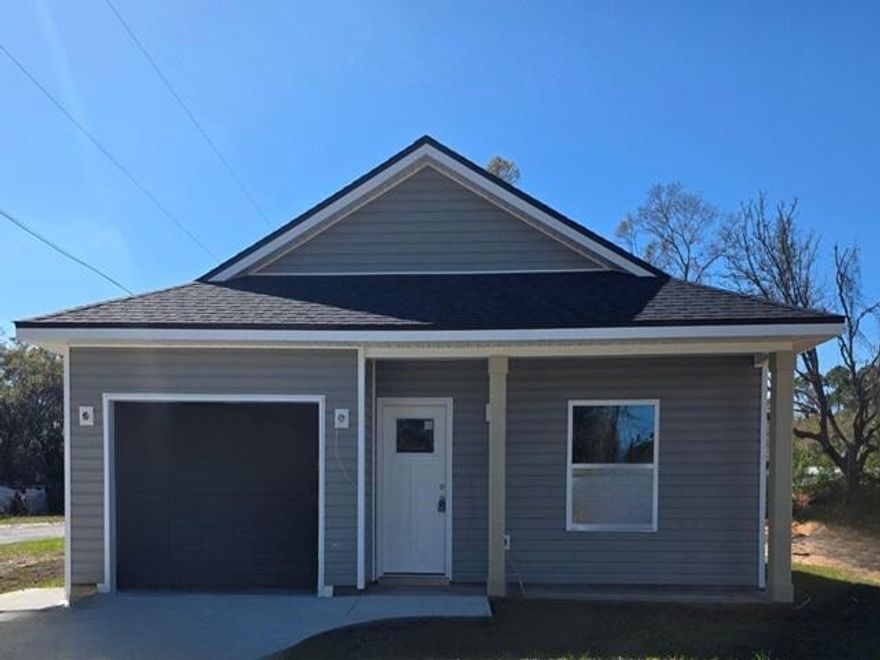 PRESALE. Need numerous properties for your portfolio? We have numerous new builds in area and coming. A new construction home featuring 3 bedrooms, 2 baths, and a 1-car garage, ideally located just minutes from the Navy base, shopping, dining, and entertainment. This thoughtfully planned home offers a spacious primary suite with an elegant tray ceiling, plus a spa-like bath complete with a double vanity and walk-in closet. The open-concept kitchen is a standout, showcasing a center island, Whirlpool stainless steel appliances, shaker-style soft-close cabinetry, and ample quartz countertop space--perfect for the home chef and effortless entertaining. Buyers have the rare opportunity to request select spec changes up to two weeks prior to construction start. Additional features include  non-impact windows with fabric hurricane protection and placement in an X flood zone means NO flood insurance required. Secure this home early and personalize your new construction before it begins!