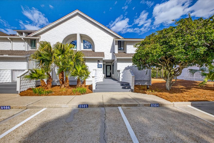 STUNNING UPSTAIRS CONDO WITH SWEEPING BAY & MARINA VIEWS IN HERON WALK. Enjoy breathtaking views of Jolee Island, Choctawhatchee Bay, and Baytowne Marina from this beautifully updated upstairs residence in the highly sought-after Heron Walk community.

Inside, the completely renovated kitchen immediately stands out with its stylish new countertops, custom cabinetry, updated appliances, and modern fixtures--beautifully blending functionality with coastal elegance. Thoughtful upgrades throughout the condo create a light-filled, inviting atmosphere designed for both comfort and style.

This spacious 2-bedroom, 2-bath condo offers approximately 1,298 square feet, including the glass-enclosed porch, which provides the perfect year-round setting to relax and take in stunning sunsets and tranquil water views. Additional features include soaring ceilings, two walk-in closets, and abundant storage throughout.

Heron Walk has recently undergone a stunning community transformation with a fresh nautical/coastal exterior palette, new Trex walkways, and NEW golf cart charging stations, further enhancing the charm and convenience of this waterfront neighborhood.

Whether you're seeking a primary residence, second home, or investment property, this exceptional condo offers the perfect blend of panoramic views, modern upgrades, and relaxed waterfront living. As an introduction to the Sandestin lifestyle, we invite our new owners to explore amenities that make Sandestin special. The listing brokerage and seller(s) are presenting the buyer(s) of this property with (2) 90-minute rounds of Tennis court time, a golf foursome at one of our three championship courses, and a round of golf for up to four (4) players at the unrivaled Burnt Pine Golf Club.

Sandestin Golf and Beach Resort features more than seven miles of beaches and pristine bay front, four championship golf courses, 15 world-class tennis courts, a 226-slip marina, a fitness center, spa and celebrity chef dining. Shop, dine and play at the charming pedestrian village, The Village of Baytowne Wharf and more. Inside the gates of the resort, residents enjoy a balanced lifestyle of high-class living, spanning the 2,400 acres from the beach to the bay. Everything within the gates of the resort is accessible by golf cart or bicycle. The entire resort is interconnected by miles of pedestrian, bike and golf cart paths that weave through groves of live oaks, meandering past natural lagoons, fountains, man-made lakes, and meticulously landscaped fairways.