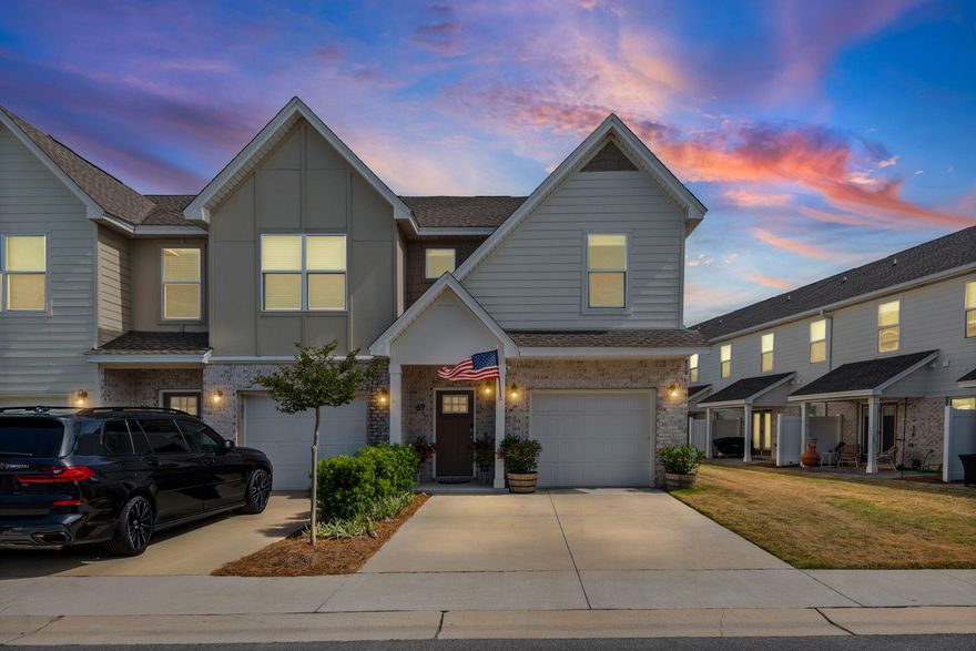 VA ASSUMABLE LOAN!! SOUGHT AFTER CORNER UNIT! Easy, low-maintenance living in the heart of Destin and steps from the beach! This 3br, 2.5ba townhome is located in the popular Tuscan Village community and offers a perfect blend of comfort & modern style. The layout is open & inviting, connecting the kitchen, dining, &  living spaces so everything flows effortlessly, perfect for relaxing at home & hosting friends. The kitchen features a large island that naturally becomes the centerpiece of the home. Just inside from the garage, you'll find a convenient drop zone for shoes & bags, keeping everyday clutter tucked away & organized. Mature & lush landscaping around the patio area makes for a peaceful, private & tranquil oasis to relax and read a book or enjoy your favorite beverage.