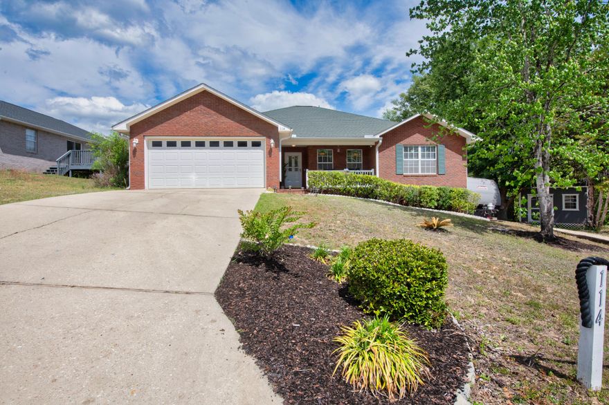 Welcome home to the perfect blend of contemporary style, functional living, and true turn-key convenience at 114 Conquest Ave. This meticulously maintained 4 bedroom, 2 bathroom home with an RV pad offers over 2,000 square feet of thoughtfully upgraded living space designed for comfort, peace of mind, and modern living. Major system updates include a roof and HVAC system both replaced in 2020, a recently serviced septic system, transferable termite coverage with nearly a full year remaining, and a complimentary HVAC tune-up within the year. The home also includes a fully installed SimpliSafe security system featuring cameras, motion sensors, base station, and smoke/CO2 monitoring, plus pre-wiring for future ADT setup if desired by future owners.

Step into a light-filled kitchen that serves as the heart of the home, featuring brand-new quartz countertops, a deep farmhouse sink, upgraded pendant lighting, newer stainless steel appliances, and modern earthy grey cabinetry that creates a fresh and sophisticated feel.

The spacious master suite offers both comfort and functionality with custom built-in shelving in the oversized walk-in closet, while the bathroom includes an additional standing cabinet for added convenience and organization.

With an acceptable offer, the sellers are also willing to include the washer and dryer, along with a secondary refrigerator/freezer combo, adding even more value to this move-in-ready home. Book your showing today! Outdoor enthusiasts will find their joy here: a fully functional RV parking pad with power hookups, and two standalone sheds; one fully wired for a workshop or hobby space! End your days on the beautiful attached covered backyard patio. Whether you're enjoying the afternoon breeze or watching a Florida thunderstorm from the comfort of your hanging swing bench under the roof covering, this outdoor retreat is the ultimate spot to unwind. Book your showing today for a home that does truly have it all.