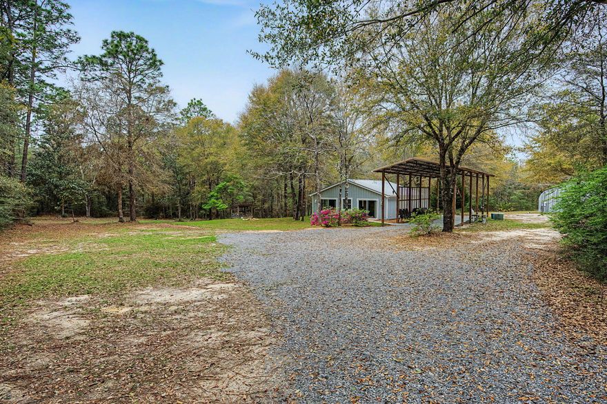 12 Acres | Workshop | Carport| Laurel Hill, FL

Private 12-acre property in Laurel Hill offering space, functionality, and flexibility. This 1-bedroom, 1-bath home features a spacious bathroom with double vanity and walk-in shower. Ideal for those seeking a quiet setting with room to expand, build, or enjoy outdoor living.

Property includes a large garage/workshop--perfect for storage, equipment, hobbies, or small business use--plus an oversized carport for additional covered parking. Open land provides opportunities for gardening, recreation, or future improvements.

No HOA. Bring your equipment, RV, or toys. Convenient access to surrounding areas while maintaining a peaceful, rural atmosphere. Buyer to verify all information.