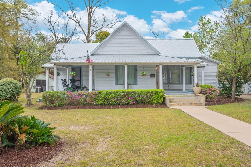 Beautiful, fully-furnished piece of 1930's DeFuniak history, walking distance from Lake DeFuniak and the charming downtown! Heavy lifting has been done new 2023 metal roof, new electrical/wiring, new plumbing and newer paint inside and out. Some of the original hardwood floors, architectural details like oversized baseboards & high ceilings, and some tongue-and-groove showcase a time gone by. The front porch alone is picture-worthy.
Large rooms that can serve multi-purposes throughout. A bonus room that could be ideal for a nursery, home office, etc. Updated bathrooms. New washer, dryer, & fridge. Fully insulated roof. 
Zoned R2, with room to add a dwelling for family or a rental to offset a mortgage. Ready to rent short/long term or move in! Currently renting short term with good numbers Home is being sold as is.