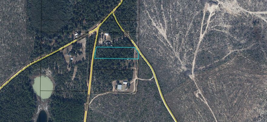2 acres outside of Sunny Hills on Porter Pond Road. You have access to the 2 acres on Porter Pond or Thomas Dr. Power on Thomas and septic and well are needed