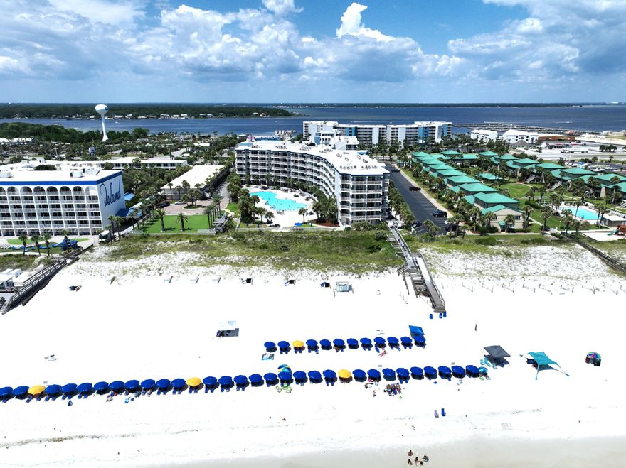 VA APPROVED! Projected rental income: $30,000-$35,000 annually. Bookings are already secured through the first quarter of 2026, making this a turnkey investment or personal beach retreat. This TOP-notch studio-style condo is freshly painted and thoughtfully designed, featuring a cozy bedroom, sparkling bathroom, and fully equipped kitchen that opens into a bright living area. Step onto your private balcony and enjoy your morning coffee with ocean views and coastal breezes. Enjoy resort-style amenities, including a 5,000 sq. ft. beachside pool, Splash Garden and kiddie pool, heated pool and oversized hot tub, full fitness center, and a 700-ft bayside lazy river with waterfall, two hot tubs, and a gradual-entry pool. Pet-friendly for owners, this unit is vacation-rental ready ideal for Airbnb or VRBO hosts looking to expand in a high-demand beachfront location.