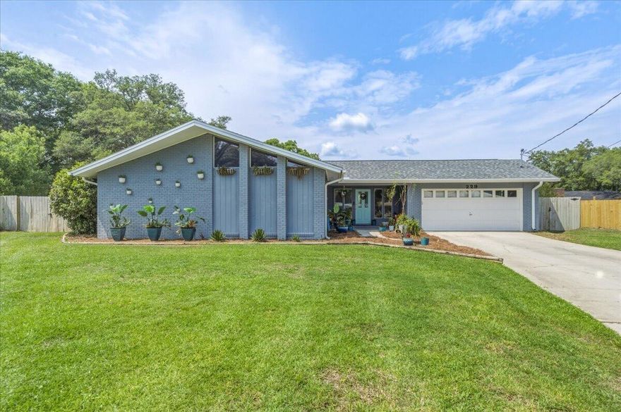 Welcome home! This stunning all-brick residence is tucked away on a quiet cul-de-sac in the heart of Fort Walton Beach, offering the perfect blend of classic charm and major modern upgrades. Step inside to find a spacious family room featuring a cozy fireplace perfect for relaxing evenings. The home boasts a beautifully renovated kitchen (2018) and a layout designed for comfort, including a master bath remodel (2018), a freshly updated hall bath (2024), and a brand-new laundry bath (2024). For those who love the Florida lifestyle, the enclosed patio (2022) features massive 12-foot sliding glass doors that open up to your private oasis. The exterior is just as impressive, sitting on a large, irregular lot filled with shade trees, flowering shrubs, and even a fruit-bearing fig tree. The expansive fenced-in backyard offers plenty of room for play or pets. Peace of mind comes standard with a long list of high-value updates: Energy Efficient: Fully owned Solar PV system (2020) and a new 4-ton HVAC system with all-new ductwork (2021). Updated Systems: New PEX water lines (2023), PVC sewer lines (2021), and copper wiring (2019). Reliability: New dimensional shingle roof (2020), new hot water heater (2024), and a new dishwasher. Bonus: The refrigerator and brand-new washer/dryer (2025) all convey! Centrally located with easy access to Eglin AFB and Hurlburt Field, local schools, shopping, and the world-famous white sand beaches of the Emerald Coast. This move-in-ready gem truly has it all!