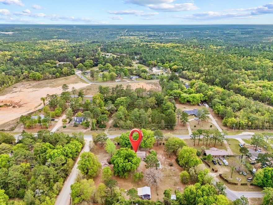 Bring your horse to this beautiful country home that is in a great location.  It is south of the interstate on Coy Burgess Loop so you are close to Freeport and the beaches.  This beautiful brick home with a metal roof has 3 bedrooms 2.5 bathrooms, garage, and large sun room overlooking the back yard.  The yard is fully fenced with two horse paddocks, run in shed, and a building with water and electricity and a horse stall. The property is bordered by 3 roads so you only have one neighbor in the backyard.