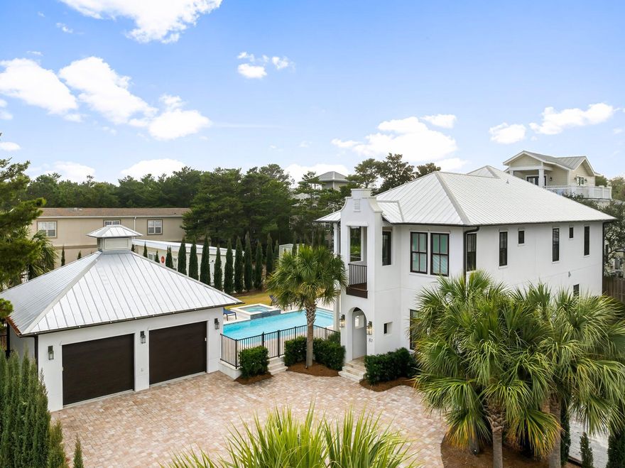 Built in 2020 and set on a rare quarter-acre double lot, 81 Brown Street offers 3,066 square feet of well-executed coastal living in the heart of Seagrove Beach. Located a short walk from Ramsgate and Eastern Lake beach access, the property combines scale, privacy, and flexibility with no HOA restrictions.

The five-bedroom, four-and-a-half-bath layout is designed for both comfort and function. The main living area is open and connected, anchored by a kitchen with granite countertops, custom cabinetry, a large island, and a professional-grade six-burner gas range. Finishes throughout include full bamboo flooring, luxury tile, and clean, durable materials suited for full-time use or rental. Three spacious king suites offer flexibility for owners and guests, while a separate guest room and bunk room share a well-appointed hall bath, providing privacy and comfort for family and guests.

The outdoor space is a defining feature. A heated pool and spa, custom fire pit, and Italian cypress-lined perimeter create a private setting uncommon for this location. A detached garage and extended driveway accommodate up to eight vehicles, addressing one of the primary limitations in the 30A market.

Positioned in Flood Zone X and within walking or biking distance to Greenway Station, the property offers direct access to dining, coffee, and retail while maintaining a quiet residential setting. The combination of lot size, location, and lack of restrictions makes this a highly usable and increasingly scarce offering in Seagrove Beach.