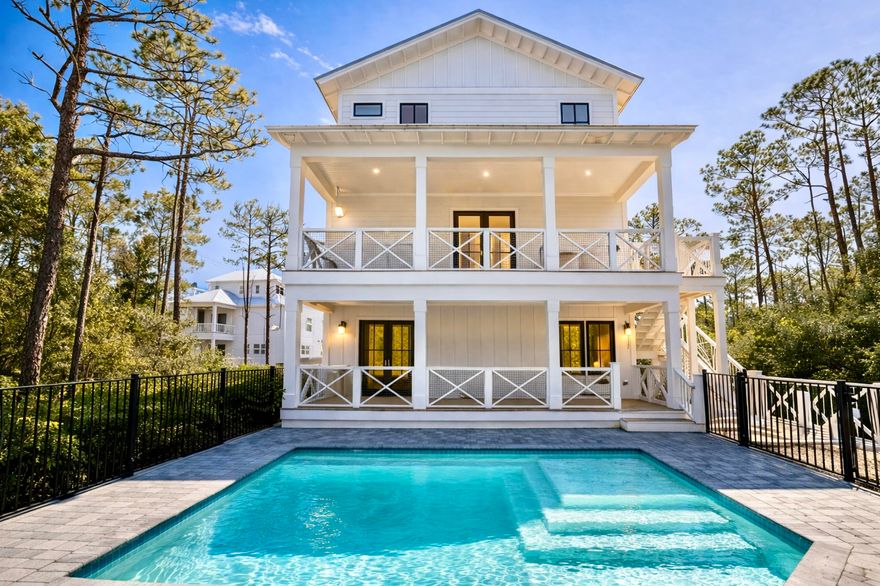 Brand new - 5 bedroom, 5.5 bath house in gated Treetops neighborhood adjacent to Seacrest with excellent rental projections ($150,000+) and deeded beach access just half a mile away. (Free golf cart beach shuttle picks up 50 yards from house) Enjoy a coastal chic, open concept design perfect for entertaining. The main floor (second floor) includes the living room, dining room, kitchen and laundry room. The first floor includes a two-car garage, entry way and two guest suites with private bathrooms. The third floor includes the spacious master suite with a luxurious master bathroom and a huge closet. The third floor also hosts two additional guest suites with private bathrooms. Treetops offers direct access to both 30A and Hwy 98 with easy access to Rosemary, Seacrest and Alys Beach.