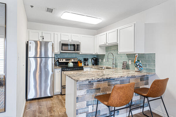 GRAND CARIBBEAN WEST CONDO - Residential