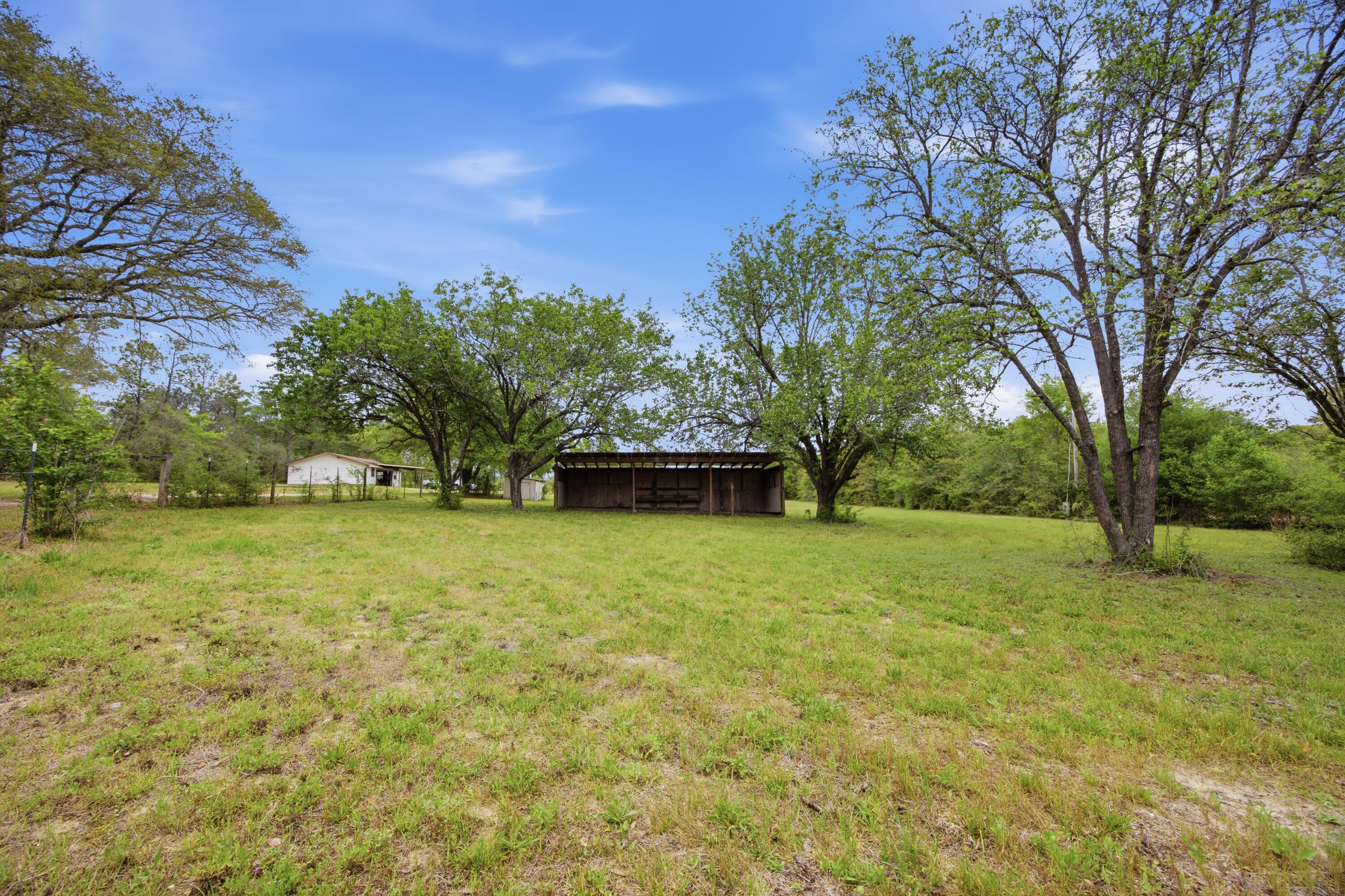 COM SE COR OF W1/2 OF SEC N100 FT W60 FT TO POB W240 - Residential