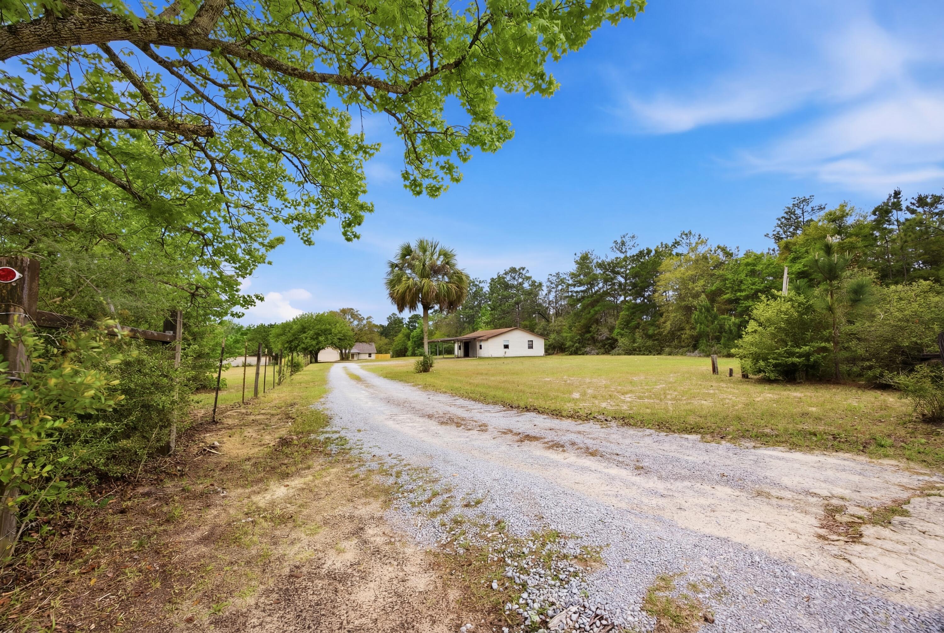 COM SE COR OF W1/2 OF SEC N100 FT W60 FT TO POB W240 - Residential