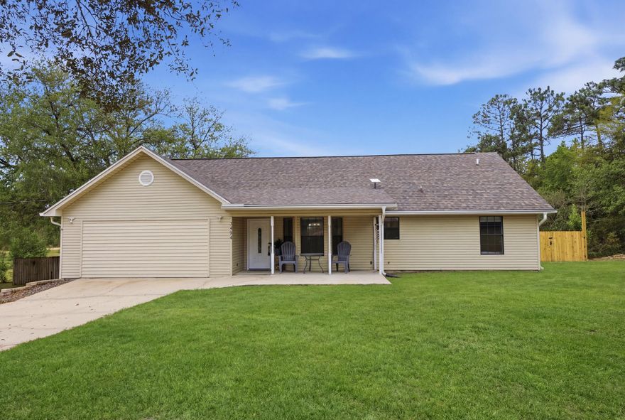 Experience the perfect blend of country charm and modern convenience at this exceptional property. Nestled on 3.84 acres, this home offers plenty of room to spread out while still being close to everything you need. Located just minutes from the Ray Lynn Barnes Boat Ramp, you'll have quick access to the Shoal River for boating and outdoor recreation. Commuters will appreciate the easy access to Interstate 10 and close proximity to town. Inside, you'll find a thoughtfully designed open-concept layout with wood-look tile flooring throughout the main living spaces and a split-bedroom floor plan for added privacy. The kitchen is the heart of the home, featuring granite countertops, stainless steel appliances, and a large island with bar seating ideal for gatherings and everyday living. A fresh coat of paint gives the kitchen a bright, updated feel. Enjoy year-round relaxation in the enclosed Florida room overlooking your private backyard retreat, complete with a large in-ground chlorine pool. Need extra space? A finished loft and enclosed garage provide the perfect bonus areas for a playroom, office, or guest space. The primary suite is designed for comfort, featuring a spacious walk-in closet, dual vanities, a glass-enclosed walk-in shower, and a soothing whirlpool tub. Outdoors, the possibilities are endless. The property includes a fenced corral ready for livestock and a privacy-fenced yard with a new double gate which is perfect for securely storing a boat or RV. A 2021 roof replacement adds lasting value and peace of mind. If you've been searching for space, versatility, and a touch of Florida lifestyle, this one checks all the boxes.