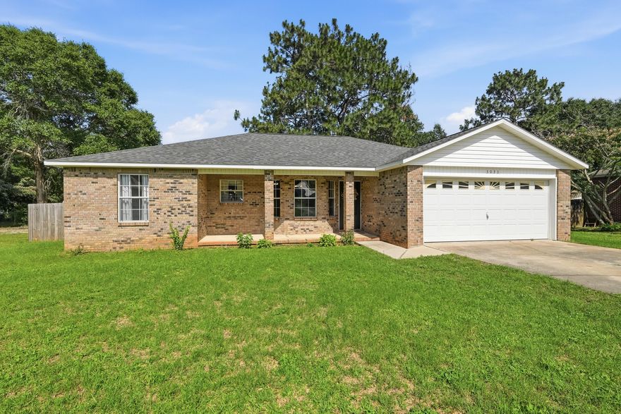 Tucked away at the end of a quiet cul-de-sac, this move-in-ready all brick home features a brand-new roof, brand-new water heater, and a 2019 HVAC system for added peace of mind. Inside, you'll find a spacious open-concept layout with cathedral ceilings in the living room, a tray ceiling in the primary suite, and a bright dining area accented by a bay window. The kitchen offers stainless  appliances, a breakfast bar, and stylish two-tone cabinetry. A laundry room with built-in shelving provides additional storage space. Thoughtfully selected designer paint colors throughout add character and personality while creating a warm, inviting atmosphere. Step outside to enjoy the fully fenced backyard featuring a large play fort with swings and slides. A rear deck provides the perfect spot for outdoor relaxation and entertaining. Conveniently located near shopping, schools, and everyday amenities.
