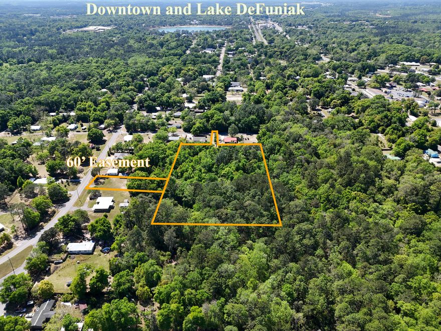 Unlock the potential of this exceptional 4.04-acre parcel located within the city limits of DeFuniak Springs. Identified as Parcel #36-3N-19-19000-007-0030, this property offers a rare opportunity for developers, builders, or those seeking a private estate setting with room to grow.

Positioned with a 60-foot easement access from Bay Avenue, the property provides both convenience and privacy--an ideal combination for a variety of residential visions. Whether you're looking to develop a small subdivision or create a spacious estate home with room for additional structures, this parcel delivers flexibility and value.

Zoned R1 within the City of DeFuniak Springs, the property is well-suited for residential development, offering the potential for multiple homesites (subject to city approvals or a single expansive homestead. The acreage provides ample space for thoughtfully designed layouts, green space, and privacy buffers--perfect for today's buyers seeking both community and room to breathe.

Enjoy the benefits of being within city limits, with close proximity to local schools, shopping, dining, and the charm of historic downtown DeFuniak Springs, all while maintaining a peaceful, tucked-away feel. With continued growth in the area, opportunities like this--offering size, location, and zoning--are becoming increasingly scarce.

Whether you're a developer ready to bring a vision to life or a buyer looking to secure land for future investment or estate living, this property checks all the boxes.

Don't miss your chance to capitalize on this versatile and well-located 4-acre tract in one of Northwest Florida's growing communities!