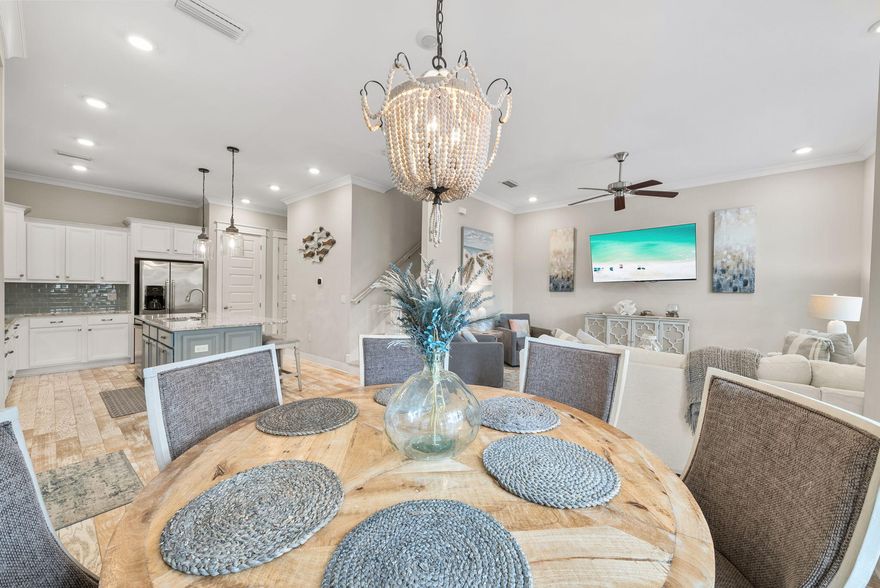 Turn-key, fully furnished, and GOLF CART INCLUDED--this beautifully appointed 3-bedroom, 2.5-bath Prominence B townhome is an ideal investment property, second home, or the perfect combination of both. Perfectly positioned in the heart of Prominence, this townhome is just a short stroll to the resort-style pool and community amenities. Inside, you'll find a professionally designed coastal interior featuring light hardwood floors, quartz countertops, custom cabinetry, glass subway tile backsplash, designer lighting, and upscale furnishings in calming natural and blue-green tones. Details have been thoughtfully curated, from upgraded plumbing fixtures and window treatments to the tankless Rinnai water heater, 10' ceilings, and 8' doors, creating a bright and refined gathering space.  The attached two-car garage provides ample parking and storage, adding convenience and value. Located in the heart of Prominence along Scenic 30A, this home offers walkable access to the community's vibrant town center, The Big Chill (formerly The Hub), featuring restaurants, shopping, outdoor movies, concerts, and events. Ideally situated between Seagrove and Alys Beach and neighboring WaterSound, Prominence blends relaxed coastal living with energy and connection. This turn-key townhome delivers the very best of the 30A lifestyle!