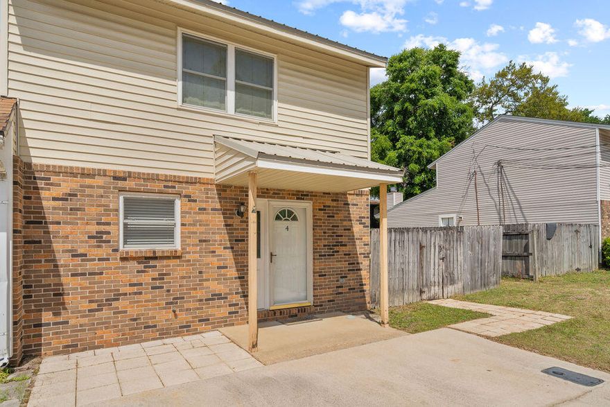 Welcome to this lovingly maintained 2-bedroom, 1.5-bath townhouse offering 1,320 square feet of comfortable, well-proportioned living space in one of Fort Walton Beach's most convenient locations -- tucked right between Eglin Air Force Base and Hurlburt Field. Whether you're active duty, a veteran, a DoD civilian, or simply someone who values an easy commute and a great community, this home is worth a serious look.
Inside, the main level flows from a welcoming living area into a functional kitchen, laundry room and a convenient half bath rounding out the first floor. Upstairs, two well-sized bedrooms share a full bath -- a layout that works beautifully whether you're settling in solo, sharing with a roommate, or setting up a guest room.
The big-ticket items are already handled. A durable metal roof (approx. 10 years old) offers lasting storm protection and long-term peace of mind -- a real asset on the Florida Panhandle. The HVAC system (approx. 5 years old) keeps things cool and efficient through those warm Gulf Coast summers without skipping a beat. This home has clearly been cared for.
The fireplace is decorative only.  Chimney was removed.

Step out back to a fully fenced yard -- private, low-maintenance, and ready for pets, entertaining, or just enjoying the Florida outdoors at your own pace.

And here's the bonus: no HOA. Just your home, your way. Add in easy access to base amenities for military and their families, the sugar-white beaches of the Emerald Coast, top-rated dining, and everyday shopping -- and you've got a location that's hard to beat. Schedule your showing today!