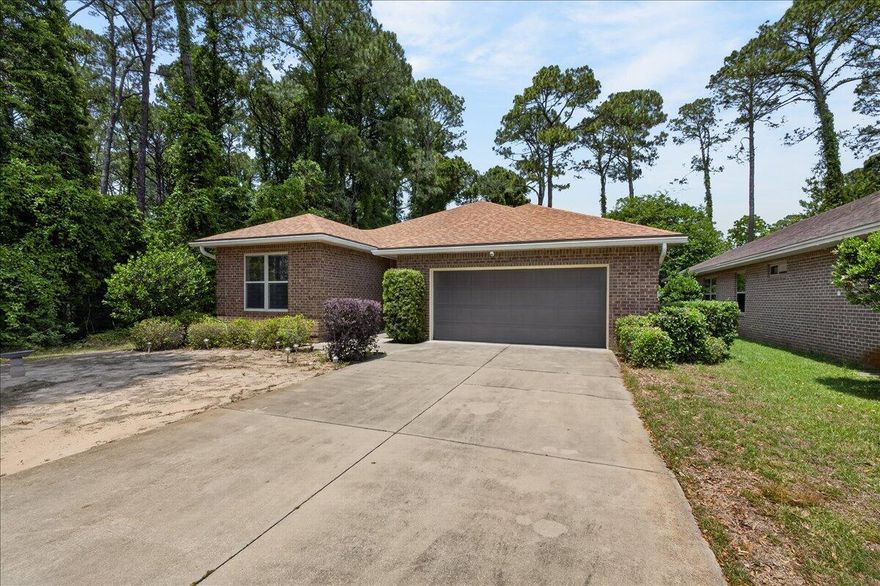 Welcome to this 2013-built gem in the heart of Niceville. This home features an open split floor plan, soaring high ceilings, and easy-care tile in the main living areas. Spacious primary suite and walk-in closet. Two car garage and plenty of parking for your boat. Step outside to a covered patio complete with a brand-new hot tub--your private backyard retreat.