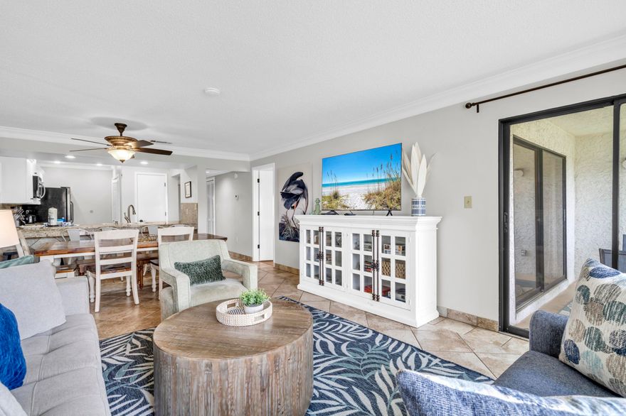 RENTAL MACHINE!!! For those seeking a proven track record of strong rental history, this is the spot! Over $37k of consistent revenue earned in both 2024 and 2025 (even with 6+ weeks of annual owner stays). 2026 already has multiple bookings! The unit recently switched to being self-managed and the sellers would be happy to transfer all information, bookings, and vendors to a new buyer for a seamless transition if desired. Seller is also offering to pay the next quarter HOAs dues for the new buyer. Edgewater Beach & Golf Resort stands out as the premier destination in Panama City Beach - offering unparalleled amenities along the Emerald Coast. Plus, the HOA has completed all of the required inspections and recently was awarded a large insurance payout. The sellers have been very happy with the HOA, the HOA board, and their own personal experience at the resort as both investors and enjoying it as guests themselves. No special assessments are pending. This stunning Villa #2306 features a spacious living area, upgraded coastal furnishings, sleeper sofa, large dining table, and a fully-equipped kitchen with freshly painted cabinets and granite countertops. The primary suite features new flooring (no carpet!), a king-sized bed, TV, and an ensuite bathroom with a sleek new double vanity and tiled shower. It is evident that significant investment was put into the renovations. Additionally, over $1000 was just spent on all new bedding, towels, pans, etc! Providing peace of mind the water heater is 2021 and the HVAC is 2019. The huge second bedroom also offers new flooring, plus two queen beds, TV, and access to the second bathroom with a tub/shower combo. Outside on the covered balcony you'll view palm trees and hedges to provide some privacy. Edgewater Beach & Golf Resort offers exclusive and extensive amenities like the 11,800sqft Gulf-front lagoon pool, nine heated pools, four hot tubs, beachfront restaurant and bar, coffee, ice cream parlor, spa, fitness center, golf course, and lighted tennis/pickleball/basketball courts. Conveniently located, the resort provides direct access to the beach, water sports, and beach chair service. Outside the guarded security gates, you'll find a variety of dining options, from NY-style pizza to upscale seafood. With its unbeatable location, exceptional amenities, and proven rental potential, Villa #2306 is a must-see gem in one of PCB's most sought-after resorts! Schedule your showing today! A video tour is also available