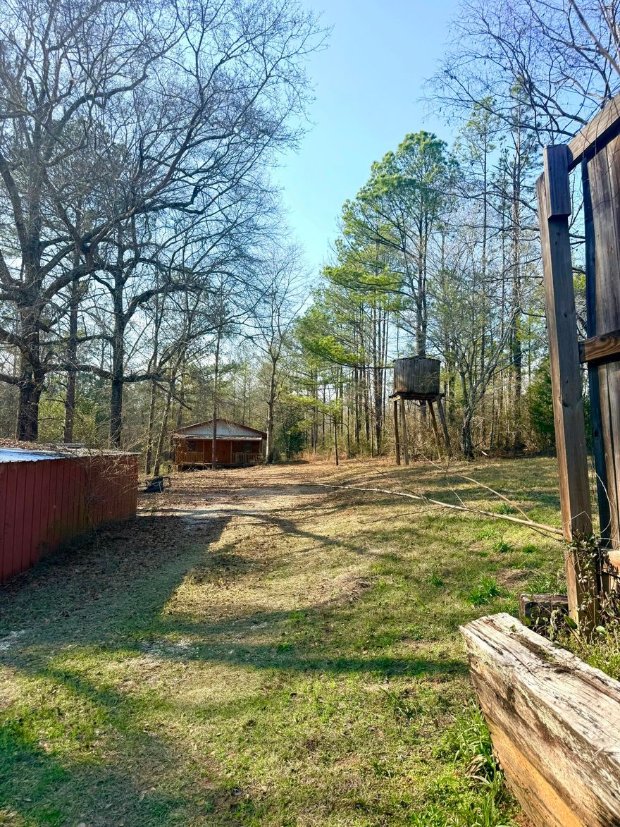Welcome to 2483 Jordan Road, Flomaton AL 36441! Quiet camp-style retreat on 4 acres just minutes from downtown Flomaton! This 1,080 sq ft home, built in 2014, features 2 bedrooms and 1 bathroom with custom woodwork throughout the interior, creating a rustic atmosphere.

The partially wooded property offers 250 feet of road frontage and over 400 feet of creek frontage along the west side, providing a peaceful natural setting to enjoy year-round.

A large wood frame barn offers excellent space for storage, equipment, or workshop use, and a separate metal shed sits further up the hill on the property for additional storage.

Conveniently located just 6 minutes from downtown Flomaton, this property offers the perfect blend of privacy, recreation, and accessibility.

Property being sold As-Is
