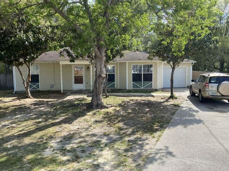 If you need an affordable charming home, this 3 bedroom 2 bath home with one car garage sits on .4 acre and is perfect for YOU!  Seller will put new roof on prior to closing!  The galley style kitchen has ample small tile counters and plenty of cabinet space.  That's right!  This home has a huge backyard patio on an irregular lot and is wooded to the back on 4 tenths of an acre.  Room for kids to play and have BBQs in the backyard!  Your home has a split bedroom plan with the master bedroom on one side and the children's / guest bedrooms on the other side!  Don't hesitate to make your appointment, or it will be gone!  Cheers!