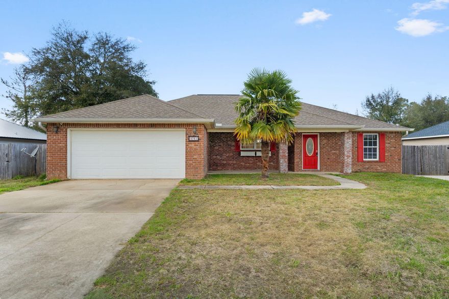 Motivated Seller! Welcome to the one you have been waiting for in North Crestview. Perfectly positioned with quick access to I-10 and Hwy 285, you can be in Freeport, Niceville, or Destin with ease while still enjoying the peace and space of North Crestview living. This 3 bedroom, 2 bath home delivers space, storage, and serious functionality. The spacious kitchen is a showstopper featuring granite countertops, stainless steel appliances, abundant cabinetry, and a window overlooking the front yard that fills the space with natural light. Whether you love to cook or entertain, this kitchen was built for it. The oversized laundry area gives you room to breathe, and the two car garage offers extra space for storage, tools, or toys. No cramped corners here. The primary suite is  exactly what you want at the end of a long day. A large master bathroom with double vanities, a walk in shower, garden tub, and a massive walk in closet makes this space feel like your own private retreat. Step outside to your screened in back porch and enjoy your morning coffee while overlooking a spacious backyard that is perfect for pets, play, or even a future pool. The front of the home features classic brick accents with low maintenance vinyl siding along the sides for durability and curb appeal. Gutters already installed. Layout that makes sense. Location that works for real life. If you have been waiting for a home that checks the boxes and then some, this is it. Schedule your showing and see it in person before someone else does.