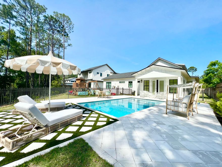 Embrace tranquility in the perfect family, second, or retiree home, where a picturesque cul-de-sac setting meets the bayou. Discover 107 ft of spacious canal water frontage with views of Mack Bayou. This one-story sprawling ranch encompasses 4 beds, 4.5 baths, and is set on .59 acres. Entertain effortlessly in the expansive kitchen/living/dining area, adorned with ceilings over 20 feet high or step onto the large covered front and side porches, ideal for alfresco dining or simply savoring the peaceful views. Experience the custom interior finishes that elevate every corner of the home. Each bedroom offers the an en-suite bathroom, ensuring privacy and comfort for all residents and guests. Quotes are currently currently being drawn up for a proposed boat dock.