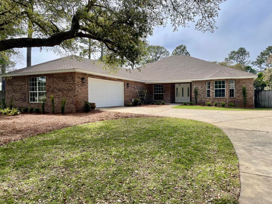 Newly updated!  Two homes in one - perfect for multi-generational living.  Main part of the home offers bright stylish coastal living with large living area with French doors that open out to covered patio and pool area.  Spacious kitchen and dining room with pool views.  Master bedroom with lots of natural light also opens to pool area.  Master bath with double vanity, large walk-in shower, and private commode room.  Two guest bedrooms, a hall bath with double vanity and large soaking tub, and a dedicated office with double French doors complete the main home.  Connecting to the main home is a private in-law retreat which functions as its own private residence - spacious living area with lots of natural light, fully functional open concept kitchen, large bedroom with two walk-in closets, bathroom with double vanity, walk-in shower, and even a hook up for a stack washer/dryer.  Direct access to the pool area.  Perfect for parents, grandparents, guests, extended family or just extra entertaining space!  This beautiful fully updated property also has a large two car garage and plenty of parking space.  Next to the new Paradise Park this home offers a great opportunity for lots of outdoor activities.  This won't last long, make an appointment to see it today!