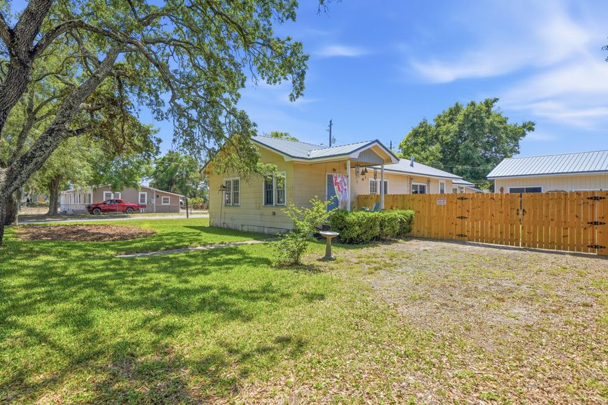 Discover this delightful 3-bedroom, 1-bathroom home in Fort Walton Beach, perfectly situated on a corner lot near the picturesque Cinco Bayou Bridge. Seller offering $8,000 towards buyers closing costs! This property is a blend of comfort, convenience, and versatility with unique features. This home offers an attached 1 car garage, a detached workshop with a 1 car garage door + a detached carport. Enjoy a refreshed and modern bathroom, meticulously renovated to offer both elegance and functionality. Keep your lawn lush and green with the built-in sprinkler system that draws from the well, ensuring easy maintenance of your outdoor space, updated electrical, sewer pipes, and new fencing! 2021 Metal roof, 2014 HVAC unit. With mixed zoning use, this property provides flexible opportunities for residential living or potential business ventures.