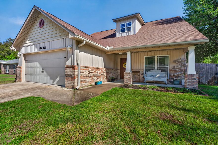 Welcome to your cozy Craftsman home--light, bright, and move-in ready. This 2014 two-story features an oversized split floor plan perfect for entertaining. Offering 4 bedrooms, 2.5 baths, plus a dedicated office off the foyer for work or study. The downstairs primary suite includes an ensuite bath with dual vanities, garden tub, and his-and-hers closets. Upstairs are three additional bedrooms and a full bath for privacy and comfort. The kitchen and dining area shine with granite countertops throughout. Large tile flooring runs through the main living areas, with tile in wet areas and carpet in bedrooms. Enjoy a .46-acre lot with room for a pool or outdoor living. A metal covered carport offers boat or RV storage. Close to top-rated schools, military bases, and beautiful beaches.