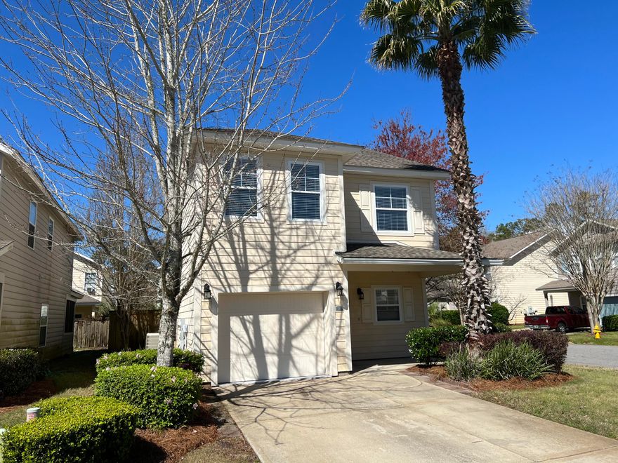 Discover a beautifully designed corner home in Santa Rosa Beach with stainless steel appliances and stylish kitchen cabinets. Enjoy spacious living and dining areas with tile flooring and plush carpeting in the bedrooms. The functional layout features a main-level bedroom with a full bathroom, while the master bedroom boasts a pitched ceiling, walk-in closet, and a master bath with soaking tub and separate shower. Two additional bedrooms share a third full bathroom. A large laundry room adds convenience, and outdoor living is enhanced by a back porch, outdoor paver patio, and fenced backyard. Located in a tranquil cul-de-sac, this end unit offers a peaceful atmosphere. Schedule your visit today!