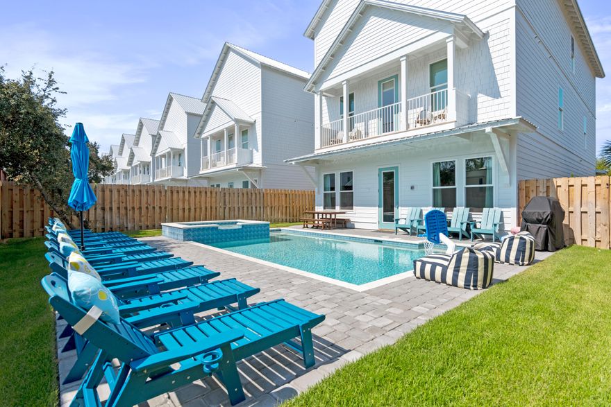 Located in Shades of Blue community in Miramar Beach, 9 Cobian Court is intentionally designed for high-occupancy vacation rentals. Built in 2024, this 8-bedroom, 9-bathroom home spans 5,040 square feet and is offered fully furnished. The interior features an open-concept first floor with a gourmet kitchen, a large social island, and stainless steel appliances. Designed for entertainment, the layout includes dedicated game rooms on every level equipped with billiards, foosball, and arcade consoles to maximize guest appeal. 

The outdoor living area features a heated saltwater pool with a waterfall spa and integrated fiber-optic lighting. The backyard is fully equipped for large groups with a covered dining patio and gas grill. Situated just two blocks from the Gulf, the property is an easy walk, bike or cart ride to the beach and Pompano Joe's. 

Silver Shells Outlets and the areas best dining are all within close proximity. This home is truly a turn-key asset for any luxury rental portfolio!