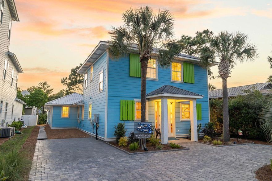 In the heart of Seagrove, just steps from the sand, local dining, shopping and the 30A bike path, this beautifully updated beach cottage offers the kind of easy coastal living that makes every day feel intentional. With deeded beach access and use easement granted to Gulf Shore Manor property owners, the four-bedroom, four-and-a-half-bath residence places the best of 30A close at hand while preserving a sense of privacy at home.
Inside, natural light fills the open-concept kitchen, living and dining areas, creating an inviting setting for everyday comfort, relaxed entertaining and time spent together after a day at the beach. Tile flooring extends throughout the first floor, where the spacious primary suite offers a quiet retreat with a remodeled spa-inspired bath featuring a walk-in shower, soaking tub and soapstone countertops. An additional first-floor bedroom and bath, with gas fireplace, enhances the home's flexibility for guests, extended family or multi-generational living.
The kitchen is both polished and practical with soapstone countertops, a Kohler sink, gas range and generous workspace designed for gathering. Outdoors, the private heated saltwater pool, expansive pool deck, separate hot tub and covered eat-up bar area create a resort-style setting made for slow mornings, sunny afternoons and casual evenings under the palms. A newly built outdoor shower, completed in 2025, adds another thoughtful touch for beach days. Beautiful landscaping, privacy shrubs, strong curb appeal and a paver circular driveway with additional side parking complete the setting, while a large outdoor storage shed offers ample room for bikes, beach gear and pool essentials. Additional features include a tankless water heater, abundant storage and a highly sought-after Seagrove address along Scenic Highway 30A. Never rented by the current owners, this inviting cottage is well-suited as a primary residence, second home, or vacation rental opportunity in one of 30A's most walkable coastal enclaves.