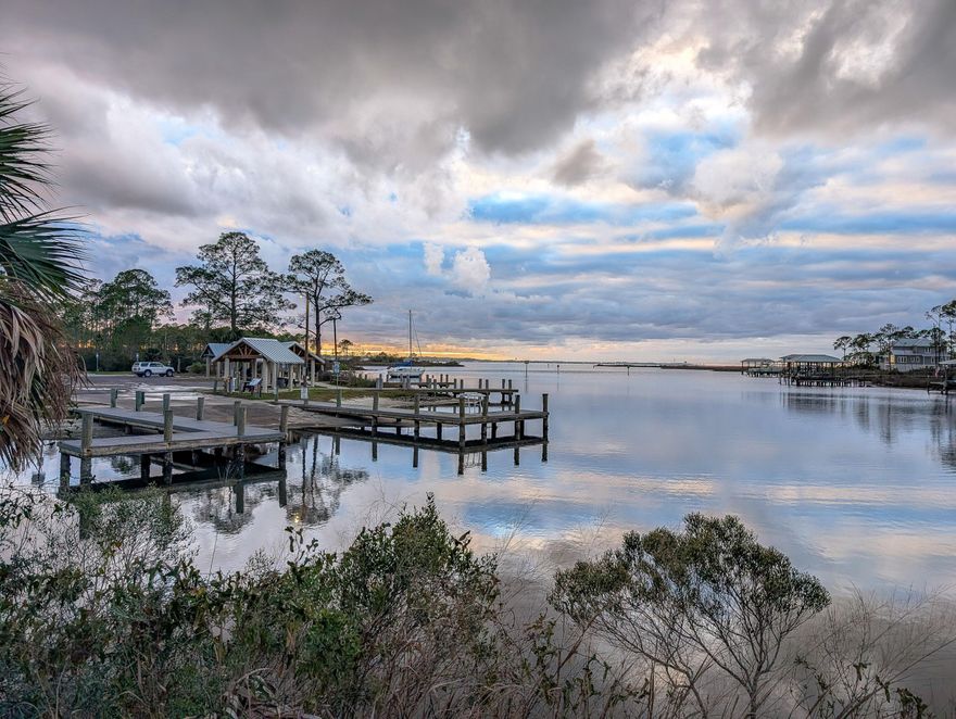Welcome to Cessna Landing. This cleared and construction-ready corner lot allows you to easily walk the property and envision the perfect placement of your future home.

Notably, this lot is approximately 11 feet larger than most in the subdivision, offering added space and flexibility—an increasingly rare find. The property is zoned AE (100-year flood plain), and homes in the community are built on pilings, providing parking and storage underneath in true coastal style.

Residents of Cessna Landing enjoy access to a community pool, beautifully maintained common community pool, beautifully maintained common areas, and underground utilities that enhance both storm safety and neighborhood aesthetics. An architectural review board ensures a cohesive, high-quality look throughout the subdivision.

Conveniently located near a public boat launch and fishing pier, this lot is ideal for boating and outdoor enthusiasts. If you've been waiting for the right place to build, your opportunity has arrived.
