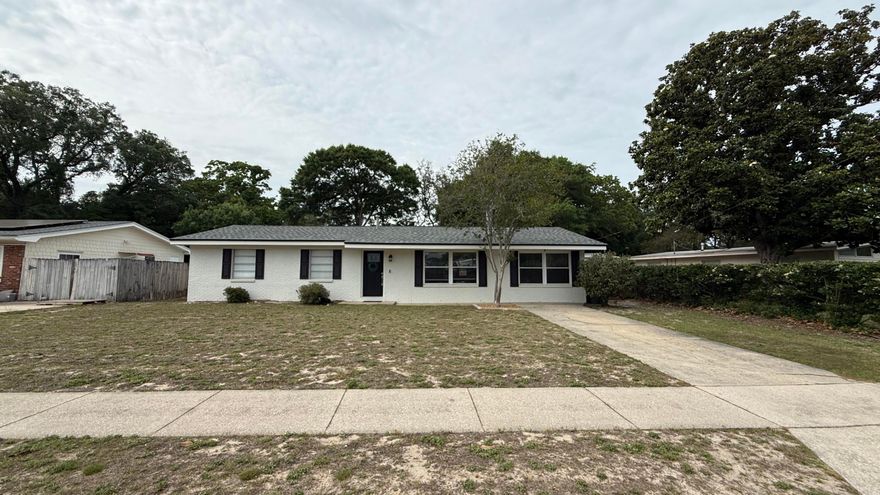 Located in desirable Yacht Club Estates & conveniently close to schools, parks, beaches, military bases, and shopping, this charming East Fort Walton Beach POOL home has been lovingly maintained and thoughtfully updated.  Offering 3 bedrooms, 2 baths, and a spacious indoor laundry room with pantry, the home features numerous upgrades within the past three years including copper rewiring, New Roof, New HVAC, new recessed lighting, updated kitchen with granite countertops and stainless appliances, renovated bathrooms, new vinyl windows in the living and dining areas, refreshed pool deck, saltwater conversion with new pool liner, and a new privacy fence. The inviting living room is nicely sized and anchored by a beautiful wood-burning fireplace.  The Formal Dining Room is multipurpose and measures 18x11!  The bright eat-in kitchen overlooks the backyard and in-ground pool, creating a perfect space for everyday living and entertaining. The primary suite is generously sized with a walk-in closet plus an additional closet, and a beautifully tiled walk-in shower. Two additional bedrooms are nicely sized, and all flooring is wood, tile, or vinyl--no carpet. The spacious backyard offers a private setting with a Large 16'x32' In-Ground Salt Water Pool and storage shed! This Move-In-Ready home is a standout opportunity with character, comfort, and modern updates throughout!