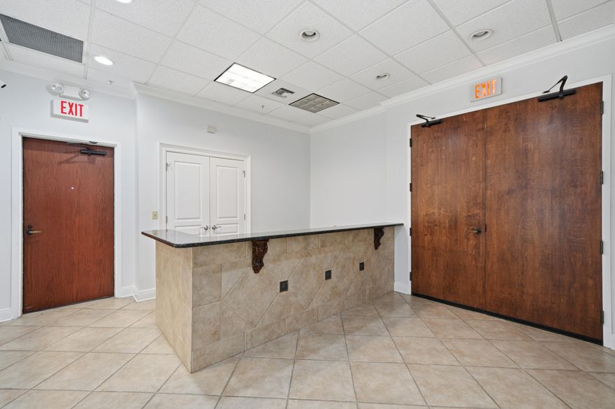 Premium office space available in the heart of Destin. This unit is move-in ready. Unit 102 is a first-floor suite featuring five private offices, ideal for a variety of professional uses. The space includes a spacious conference room with built-in cabinetry, a welcoming reception area for clients and guests, and a kitchenette/break room for added convenience.