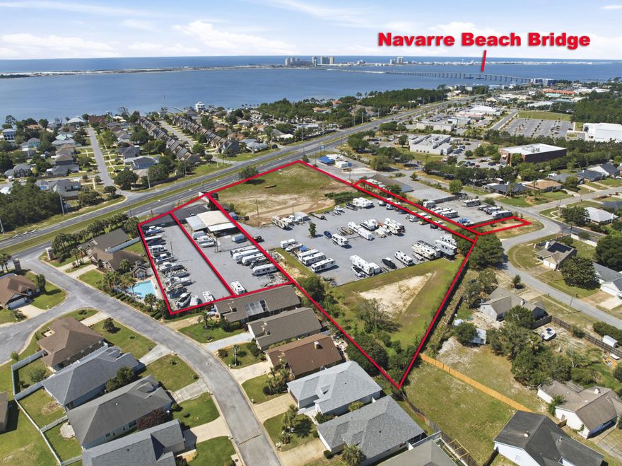 DIRECT HWY 98 facing LAND FOR SALE. FIVE PARCELS FOR SALE. 21-2S-26-0780-0BB04-000; 21-2S-26-0780-0BB03-000; 21-2S-26-0780-0BB06-000; 21-2S-26-0780-0DD00-0000; 21-2S-26-0780-0EE00-000 which includes income producing 4560 sq ft building currently housing a retail building; billboard; and boat/rv storage. There is access from Highway 98 AND paved road access to the property from Burjonik Drive.  This is an excellent opportunity to own over 6 acres and build a retail development directly on Highway 98 where more than 41,000 cars pass by each day. Large commercial property in Navarre is almost nonexistent so don't miss this opportunity to own in one of the fastest growing counties in the state!