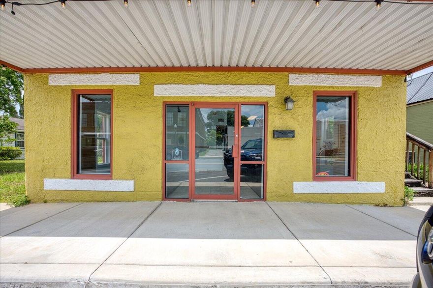 Effective Year Built 1998! 
Beautifully renovated commercial building located in the heart of Historic Downtown Crestview. Positioned within easy walking distance to local shops, restaurants, the courthouse, county offices including the tax collector and supervisor of elections, Crestview City Hall, and directly across from the Pharmacy College, this property offers exceptional visibility and convenience in one of Crestview's most active downtown corridors.

The downstairs unit features an open and airy layout ideal for retail, boutique, showroom, or customer-facing business use. The space includes two bathrooms and a convenient kitchenette, creating a functional and welcoming environment for clients and staff alike.

Upstairs, you'll find a charming office suite full of character with original hardwood floors and ceilings that showcase the building's historic appeal. The upper level offers a well-designed layout featuring a conference room, two private offices, two bathrooms, and a full kitchen -- making it an excellent setup for professional offices, consulting firms, creative studios, or mixed-use possibilities. With its prime downtown location, historic charm, and flexible layout, this property presents an outstanding opportunity for investors or business owners seeking a move-in-ready commercial space in the center of Crestview.