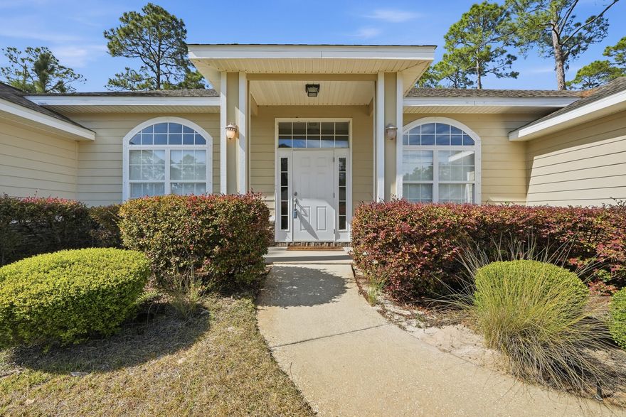Welcome to sought-after Holley By The Sea in Navarre! This one-owner 2009 custom build offers space, function, and a layout that just works. Inside, you'll find a split-bedroom floor plan and an open-concept great room with in-floor power--perfect for real living. The formal dining room and private office with French doors add flexibility for work or entertaining. The kitchen delivers with tile floors, granite countertops, stainless appliances, breakfast bar, and a sunny nook. The spacious primary suite features separate vanities and a huge walk-in closet. Step out back to a privacy-fenced yard and relax in the Florida screen room--breezes in, bugs out. HVAC replaced in 2023. Comfortable, practical, and ready to go!
