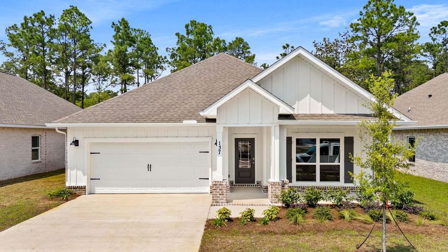 Welcome to 137 Holley Grove Lane, a new move in ready home at Holley Grove at Peach Creek. The heart of the home, an expansive kitchen, has a practical center island with quartz countertops, perfect for meal prep and space for bar seating. It has white upper and lower cabinetry throughout and a large corner pantry where storage will never be a concern. Entertaining is a breeze with the kitchen's seamless flow into the living and dining areas with EVP flooring throughout. The kitchen has a stainless-steel appliance including a smooth top stove, microwave and dishwasher.
