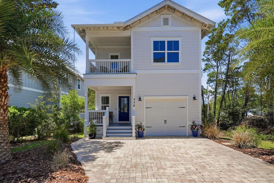 Tucked between the rare beauty of Lake Powell--one of the world's largest coastal dune lakes--and the emerald waters of the Gulf, 338 Grande Pointe Circle offers an exceptional opportunity to experience the best of the 30A lifestyle.

This fully furnished three-bedroom, two-and-a-half-bath Monroe floor plan blends timeless ''Old Florida'' charm with a refined coastal aesthetic, ideally positioned along the East end of Scenic Highway 30A. Within Grande Pointe, residents enjoy golf-cart-friendly streets, scenic bike paths, and convenient access to Rosemary Beach, Inlet Beach, and the dining, shopping, and entertainment of both 30A and Panama City Beach.

Designed for both full-time living and investment potential, the home offers approximately 1,840 square feet of thoughtfully designed living space, complete with a private one-car garage, additional outdoor storage, and a fenced, hardscaped backyard featuring a private spa hot tub for elevated relaxation. Inside, 10-foot ceilings and hardwood flooring create an inviting atmosphere throughout the open-concept first floor. The living and dining areas flow seamlessly into a bright coastal kitchen featuring a large granite island, upgraded tile backsplash, premium stainless steel appliances, and abundant space for entertaining. A convenient first-floor powder bath adds functionality for guests. 

Upstairs, the spacious primary suite offers a private balcony, dual closets, and a well-appointed en-suite bath featuring dual granite vanities, a soaking tub, and walk-in tiled shower. Two expansive guest bedrooms are serviced by a full bath complete with an extended granite vanity, custom cabinet hardware, and tiled tub/shower combination.

Bordering the protected beauty of Camp Helen State Park and the serene waters of Lake Powell, Grande Pointe offers private access to a dock and kayak launch, along with resort-style amenities including a lakefront pool and clubhouse. As well as seamless access to multiple beach access points, some of which offer ample public parking and restroom availability. Whether seeking a primary residence, second home, or short-term rental investment, this hidden coastal retreat delivers the perfect blend of natural beauty, modern comfort, and effortless access to the 30A lifestyle.