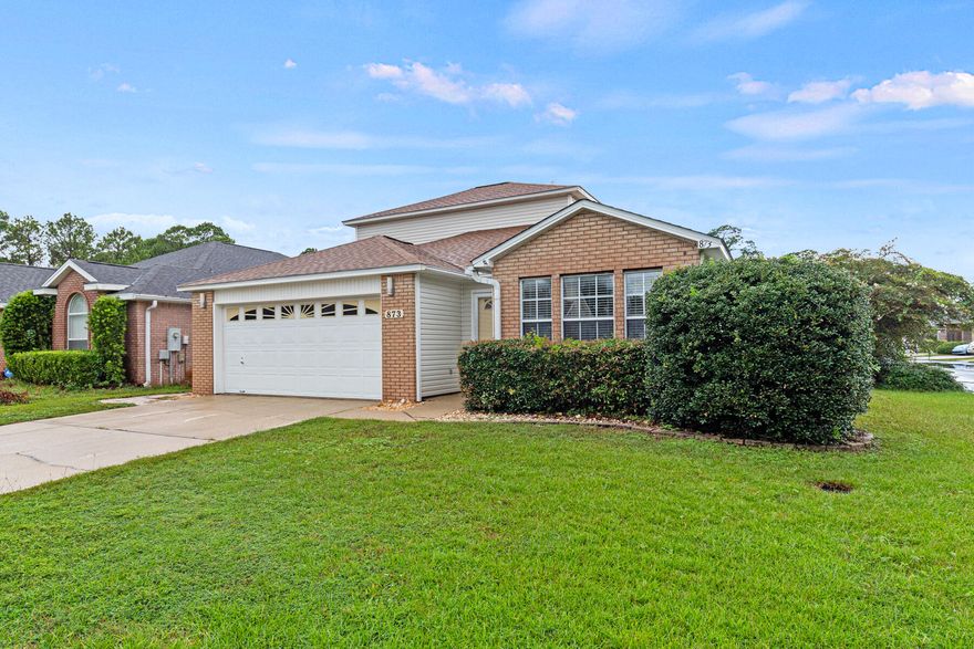 *VA buyers- assumable VA loan at 3.25%, mo. payment $1798.58, aprox balance 285K*. Cozy home on a corner lot in Shalimar Oaks Subdivision.    Eat-in kitchen with an abundance of natural light, tile flooring, stainless steel appliances, and room for large dining set. Spacious living area with vaulted ceiling. First level  includes half bathroom, laundry closet, master suite with walk-in closet, and master bath with double sink vanity & shower/tub combo. Upstairs has two bedrooms w/ walk-in closets, and full bathroom. Backyard complete with privacy fence,  storage shed for tools & lawn equipment, plus covered patio/awning for additional relaxation and shade. Roof and HVAC replaced in 2016. Water heater 2022. Termite Bond is place and kept since this home was built!