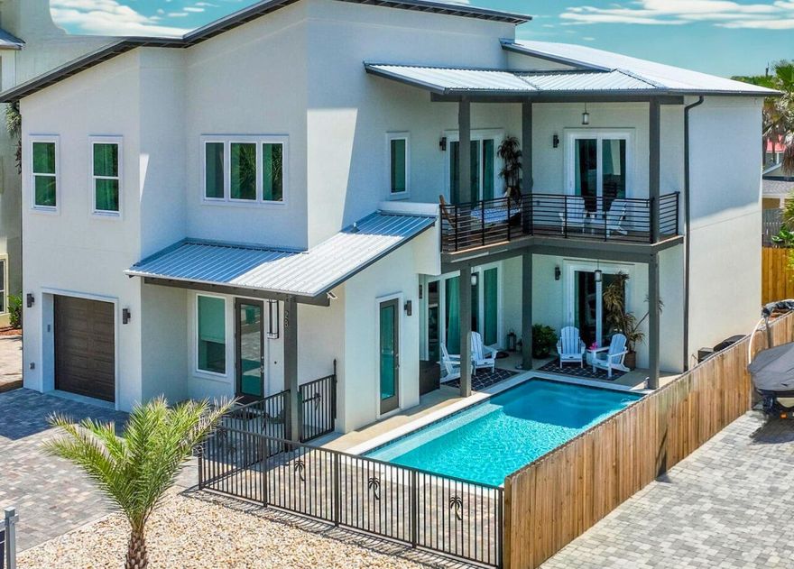 STUNNING CUSTOM HOME NEW IN 2022, POURED SOLID CONCRETE WALLS. NO HOA FEES IN PRESTIGIOUS FRANGISTA BEACH.  Only a 5 minute walk to a deeded beach access. Walk into a 28-foot Foyer with open floor plan. See the sparkles from the chandelier when sun lights it up. Each bedroom has its own ENSUITE.  PRIMARY ON MAIN WITH POOL VIEWS.  Kitchen is to die for with Chefs Kitchen and appliances with amazing surprise addons!
A 50lbs. built in ice machine keeps Parties Alive in the heated Salt Water pool with a 25 foot inside pool bench. Large open pocketed impact slider doors on both levels. Cost to Own a Concrete Home is MINIMAL AND WILL BE THE HOME WITH NO YEARLY WOOD ROT, HIGH INSURANCE OR ELECTRIC BILLS.  

NO HOA!  NO HOA!