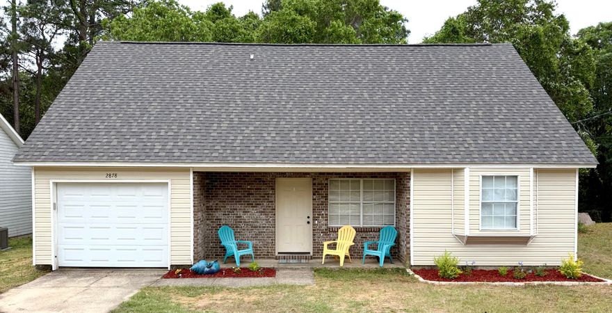 Three-bedroom, two-bathroom home located in Crestview on a 0.26-acre lot. The 1,262 sq ft two-story floor plan features a living room and kitchen at the rear of the home with ample cabinet storage and a dedicated dining area. The first floor includes two bedrooms and a full bathroom. The second floor is dedicated to the primary suite with a private bathroom. Attached one-car garage. Roof replaced in 2023. HVAC system replaced in 2023. Rear fence line in place.